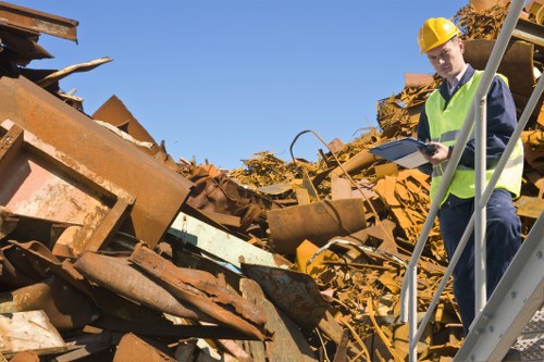 Stacked bags and labelled bins showing different waste volumes